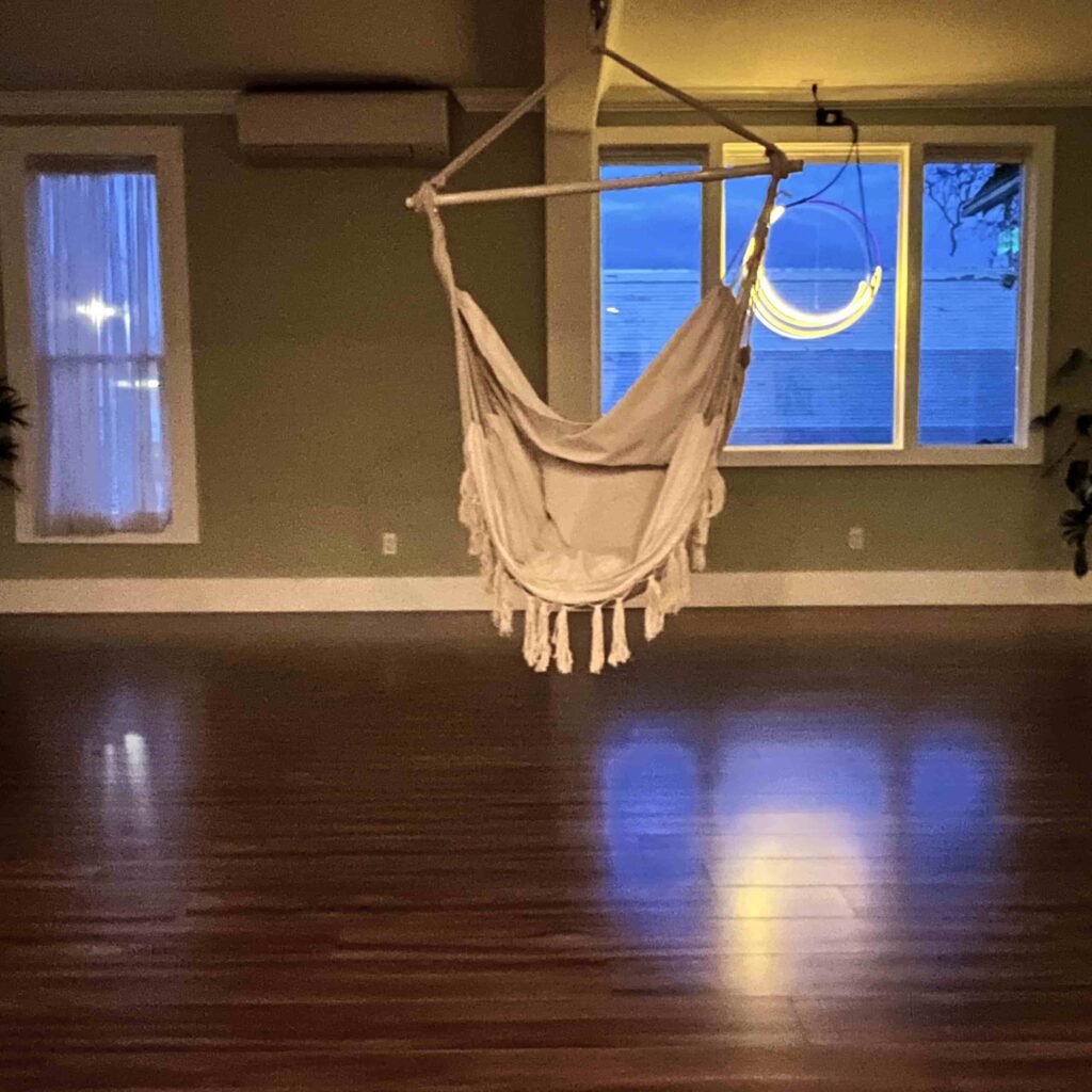 Seated hammock for a sound bath in La Conner at Crescent Moon Yoga Studio.