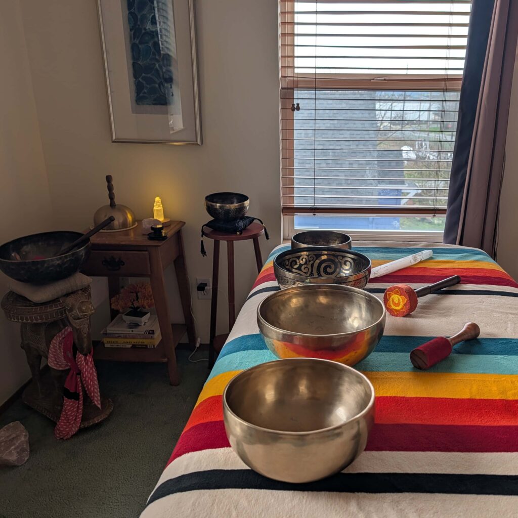 Tibetan singing bowls in a sound healing session room